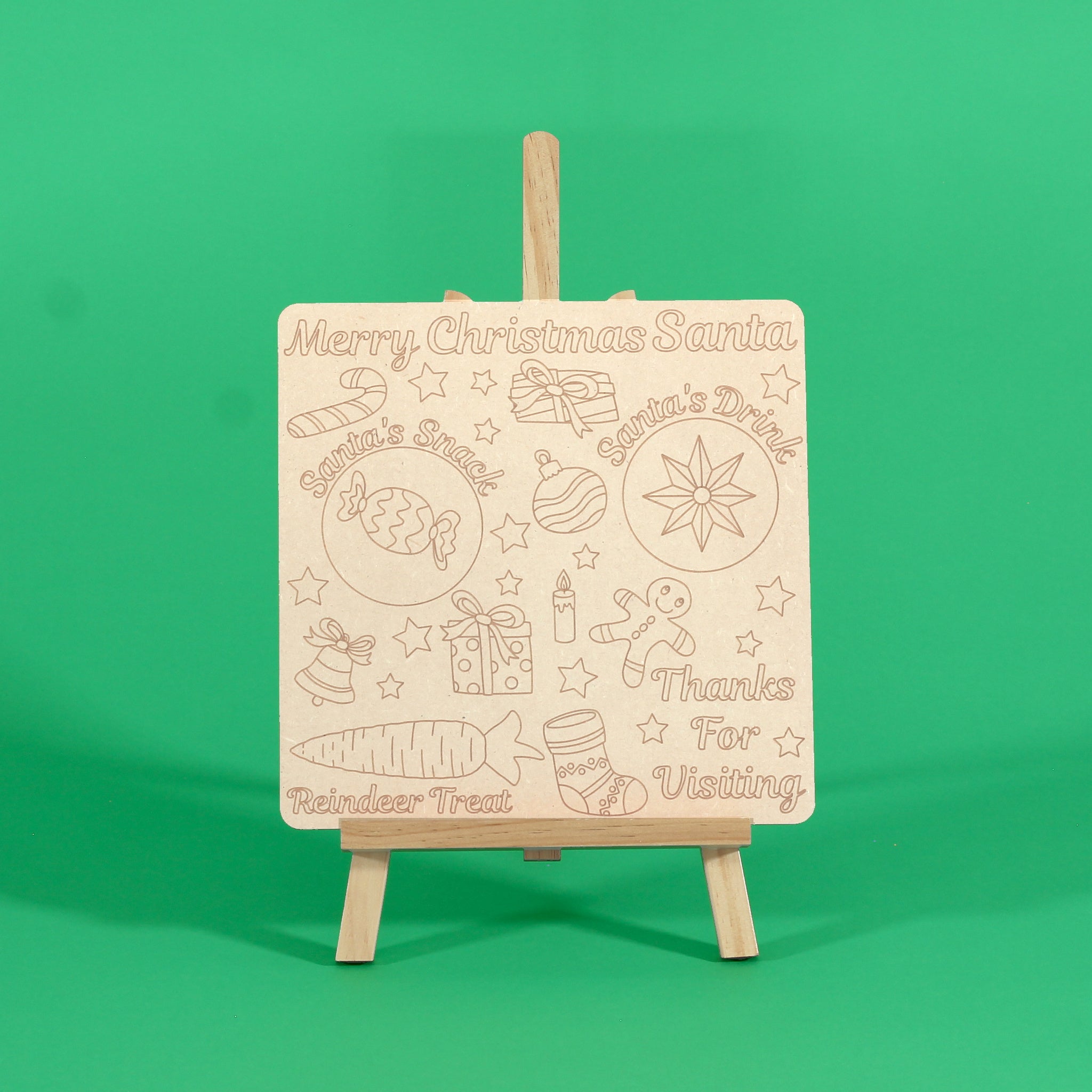 Christmas Eve Platter uncoloured engraved Santa treats board on an easel on a green background, with Santa's snack, Santa's drink and reindeer treat spots, easel not included