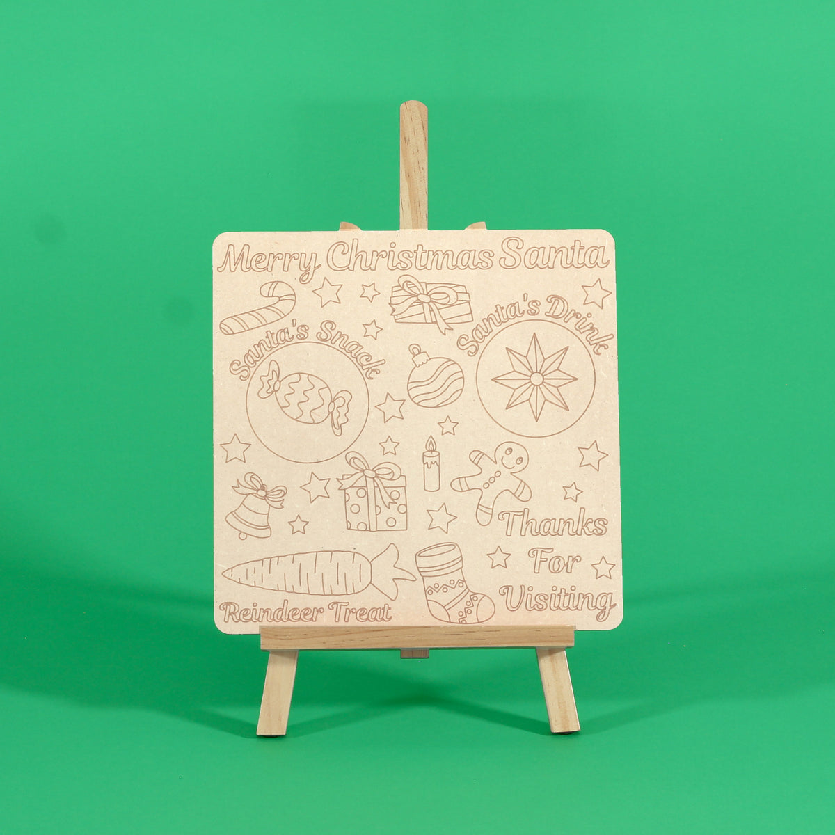 Christmas Eve Platter uncoloured engraved Santa treats board on an easel on a green background, with Santa's snack, Santa's drink and reindeer treat spots, easel not included