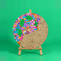 Sweet Tidings Christmas engraved art board partly coloured with swirl lollipops, wrapped lollies and bows in rainbow colours, easel not included