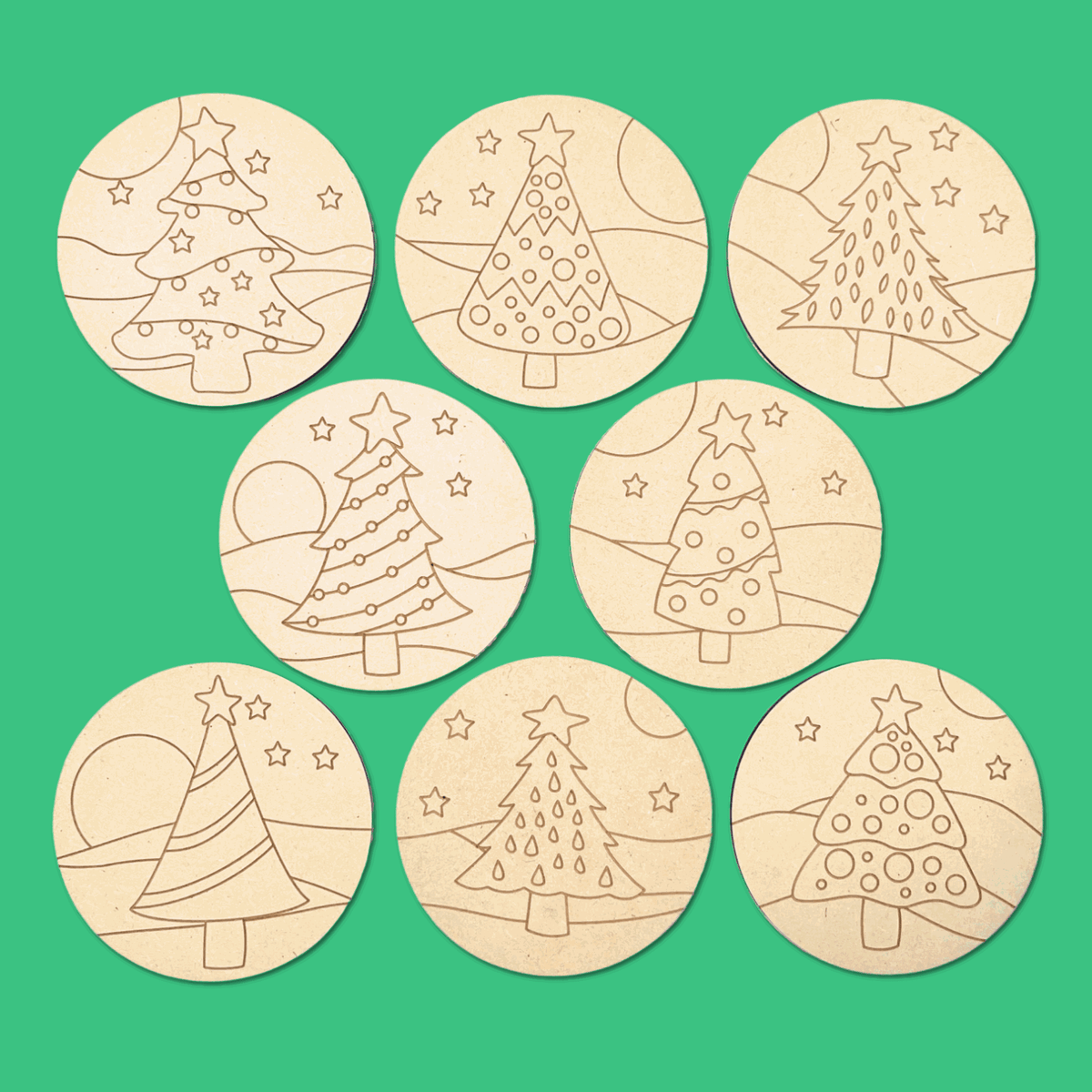 Christmas tree coasters to colour your own, scattered on green, a family Christmas craft for the table